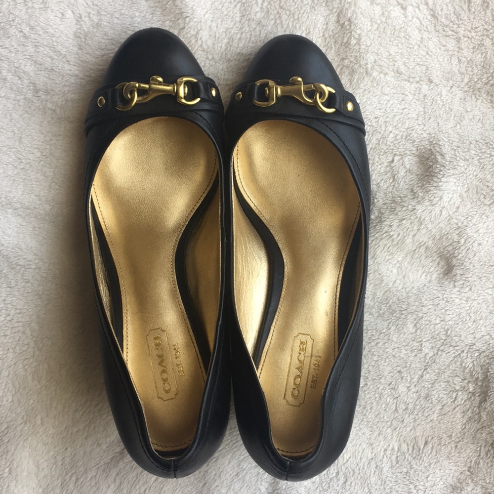 Coach black leather wedge size 7 medium.